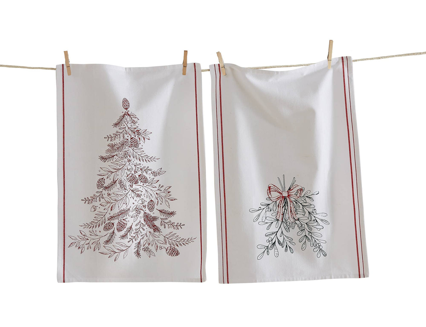 Two white towels with Christmas tree and mistletoe designs hanging on a line.