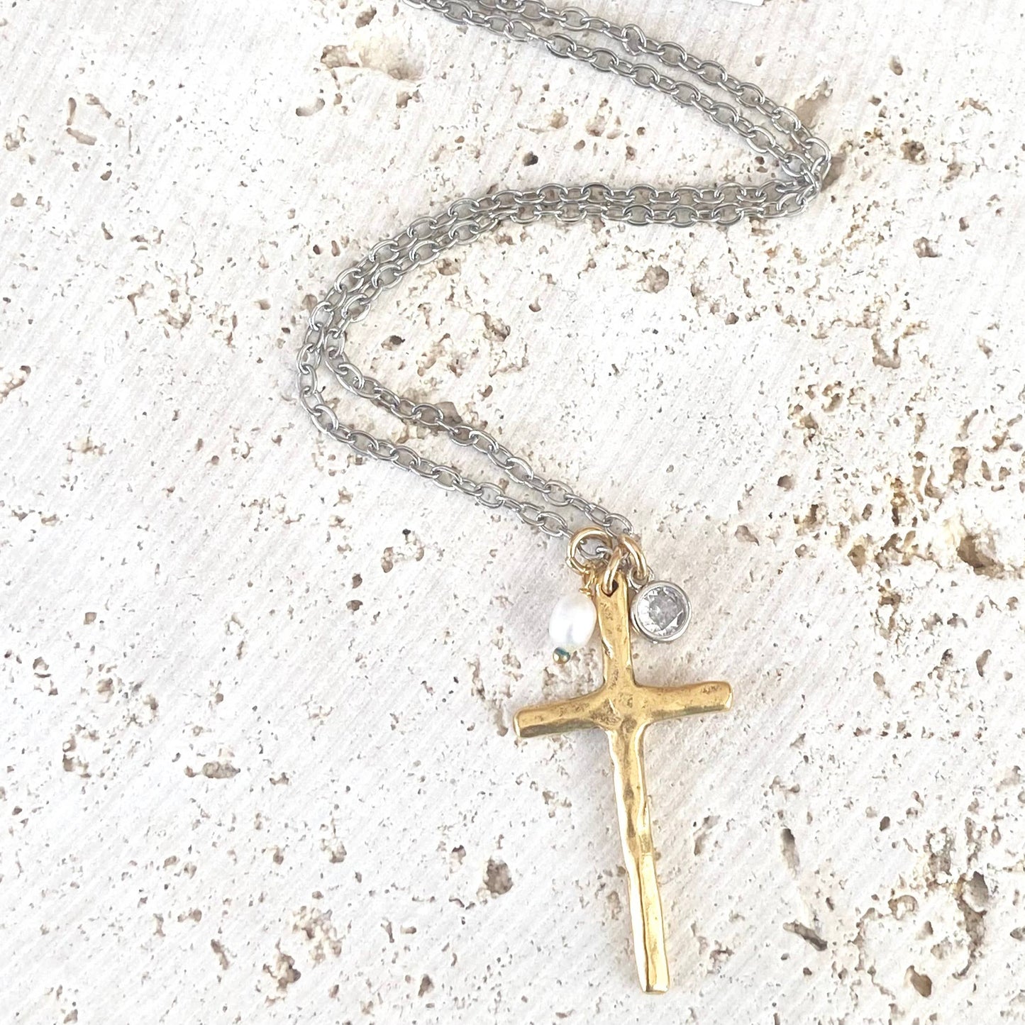 gold cross pendant with pearl and crystal charms on long chain