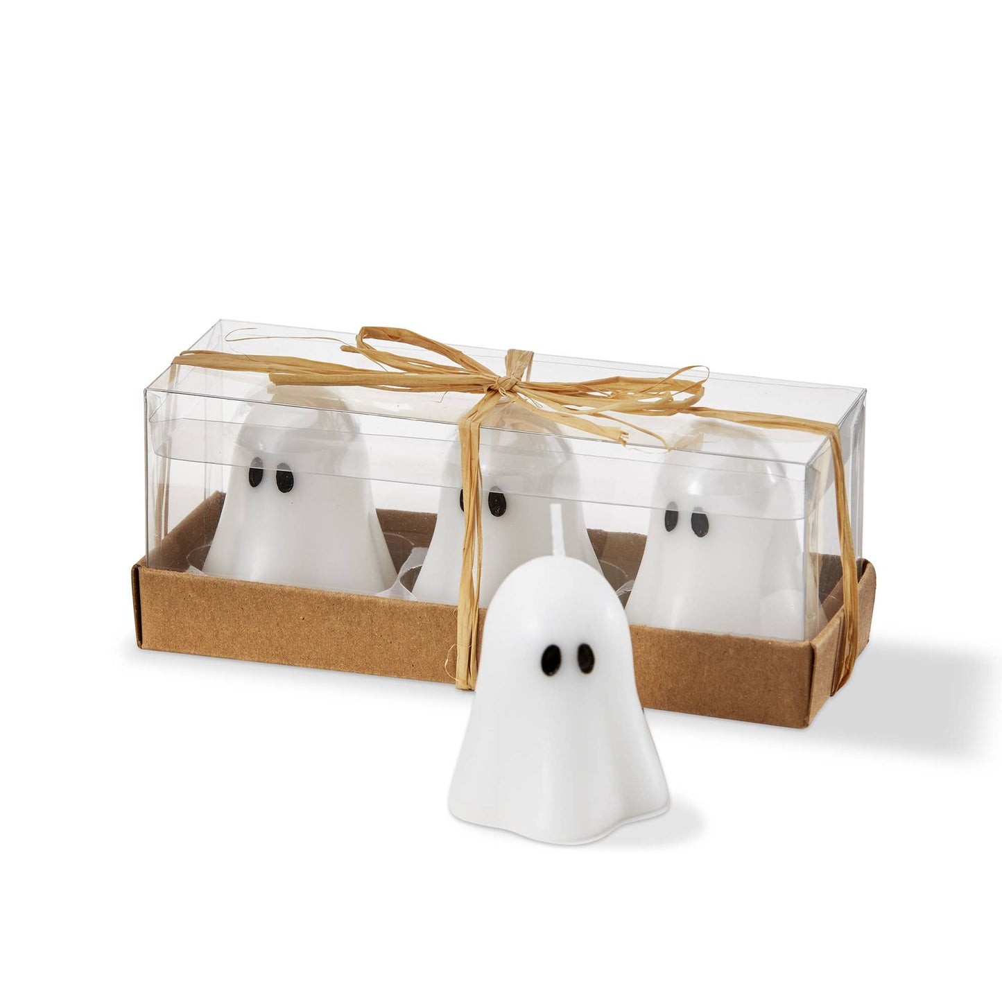 Set of ghost-shaped candles in a clear box with brown ribbon on a white background