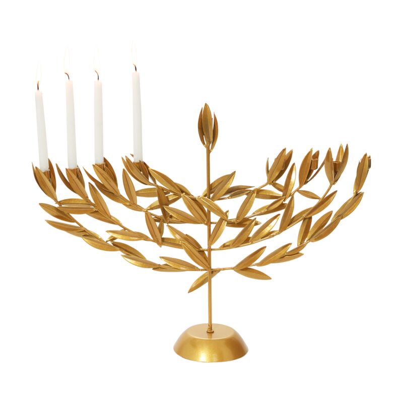 Gold leaf menorah with white candles on a white background