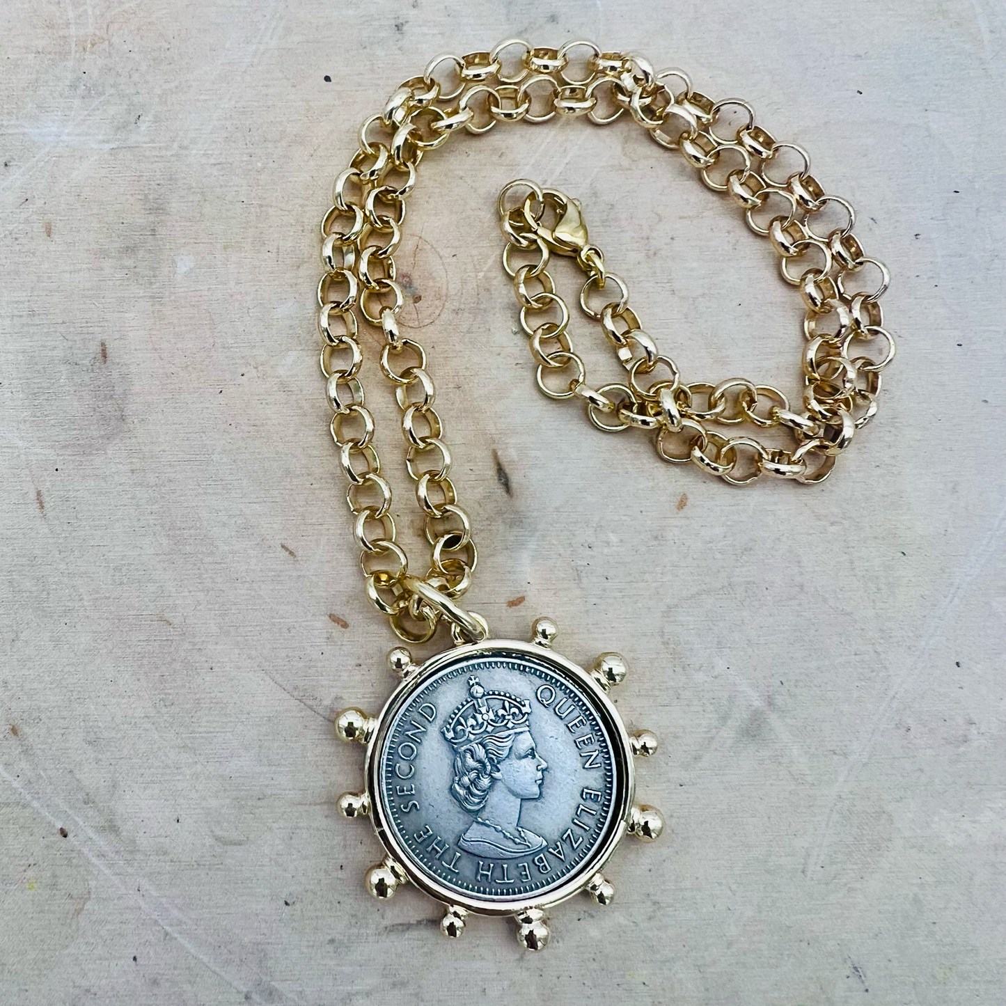 large queen coin necklace with gold rolo chain