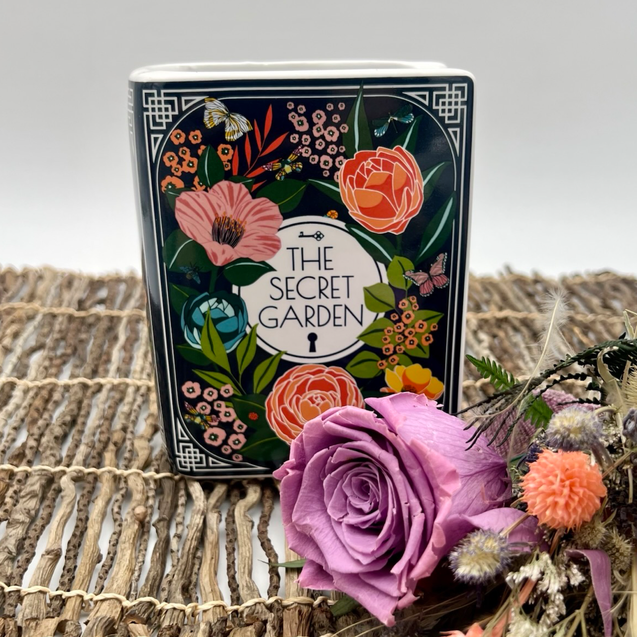 book vase with flower bouquet