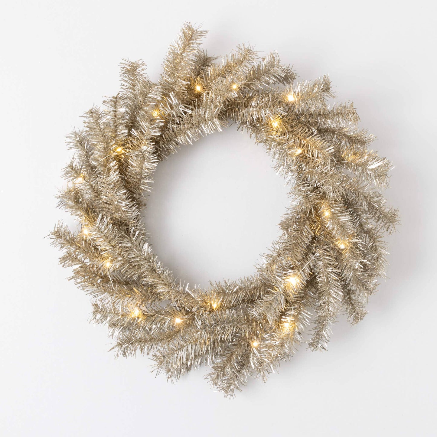 Decorative wreath with lights on a white background