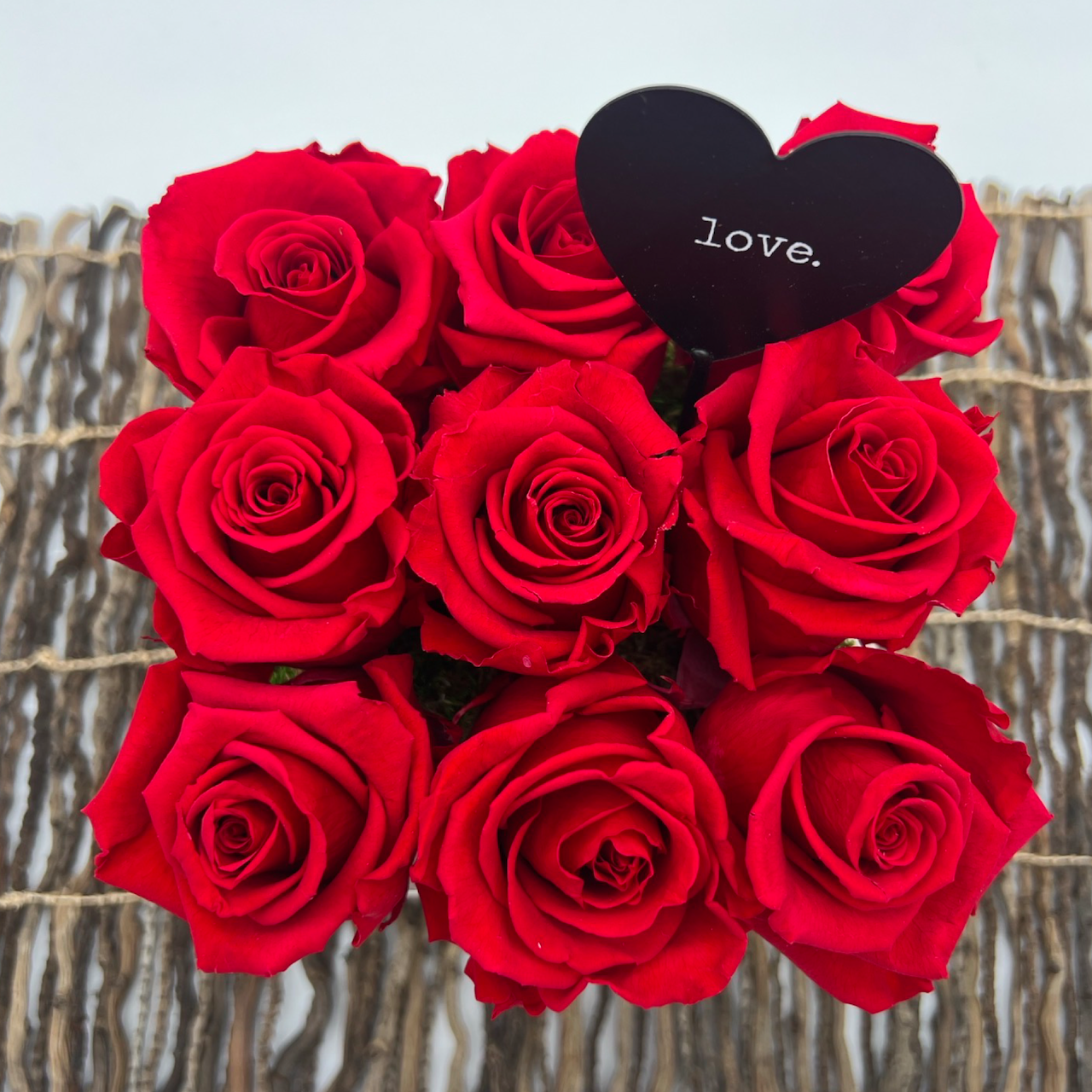 top of everlasting red rose arrangement