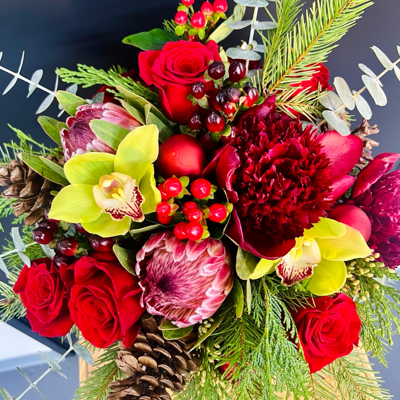 top view of large red holiday flower arrangement