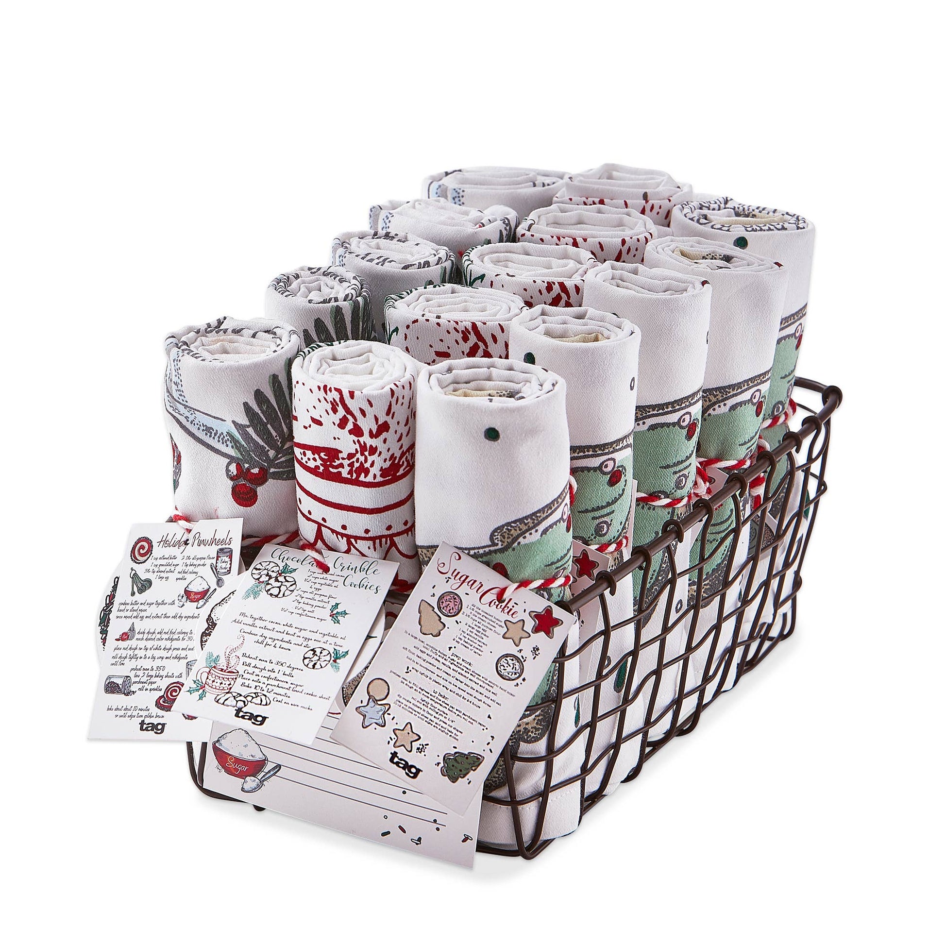 Set of holiday-themed kitchen towels in a wire basket on a white background