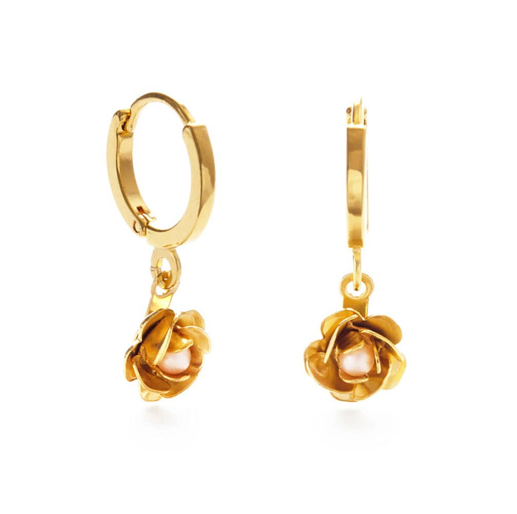 gold rose shaped drop earrings on a white background
