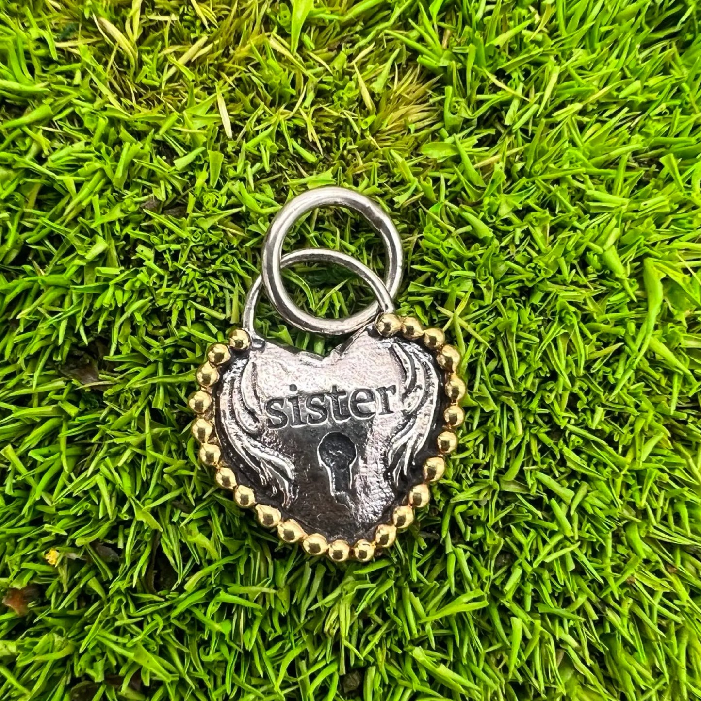 heartlock sister charm by waxing poetic