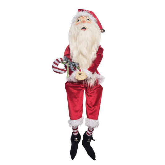 Traditional Santa Claus figure by Joe Spencer holding a candy cane on a white background