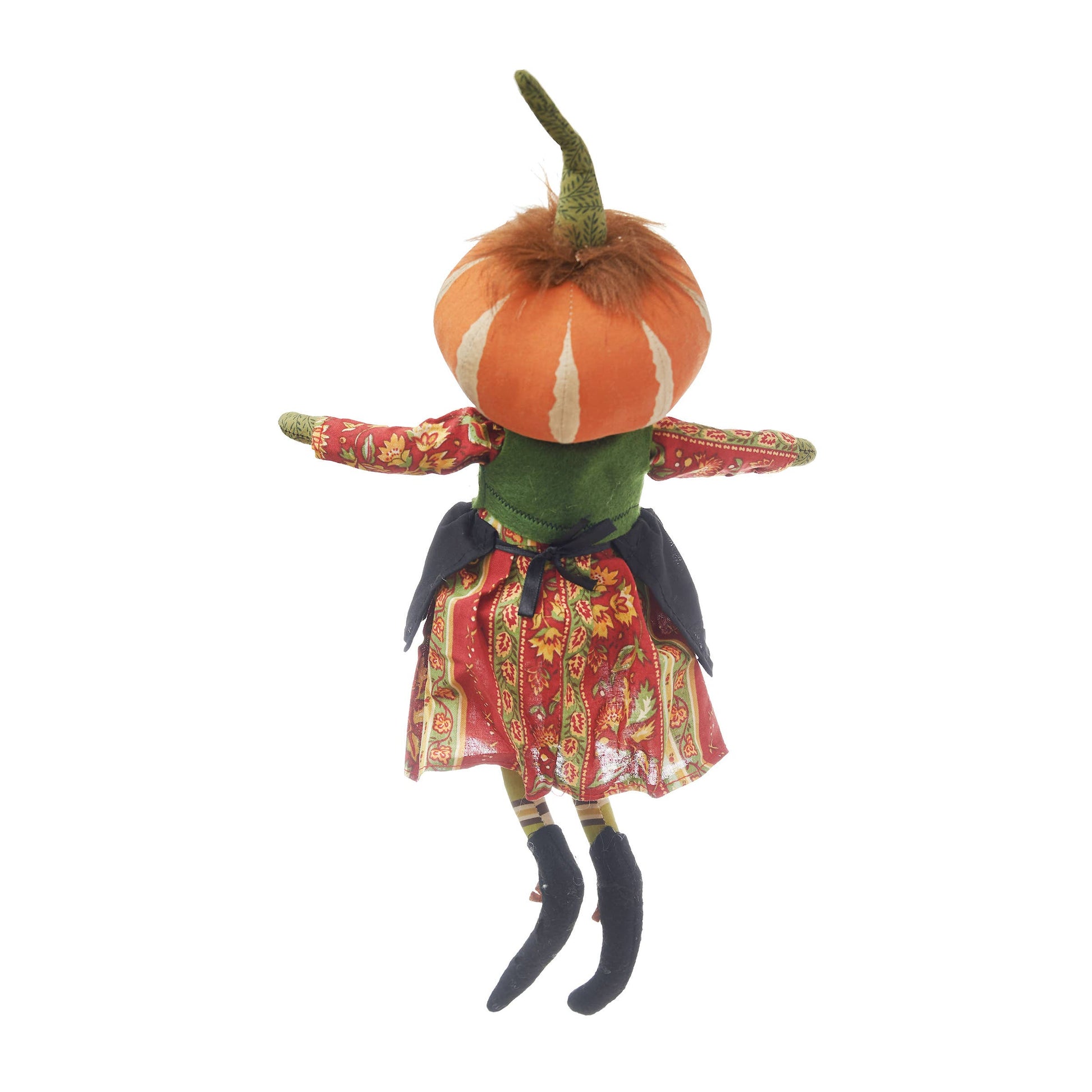 Joe Spencer art doll with pumpkin head and colorful outfit on a white background