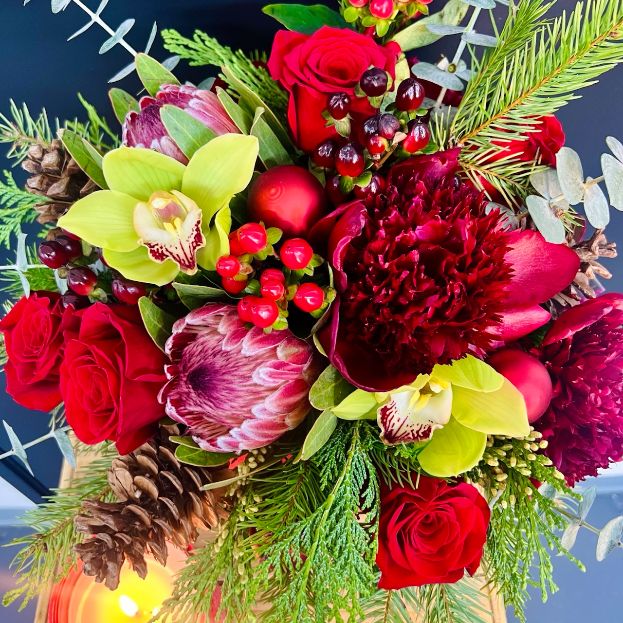 close up of large red holiday arrangement