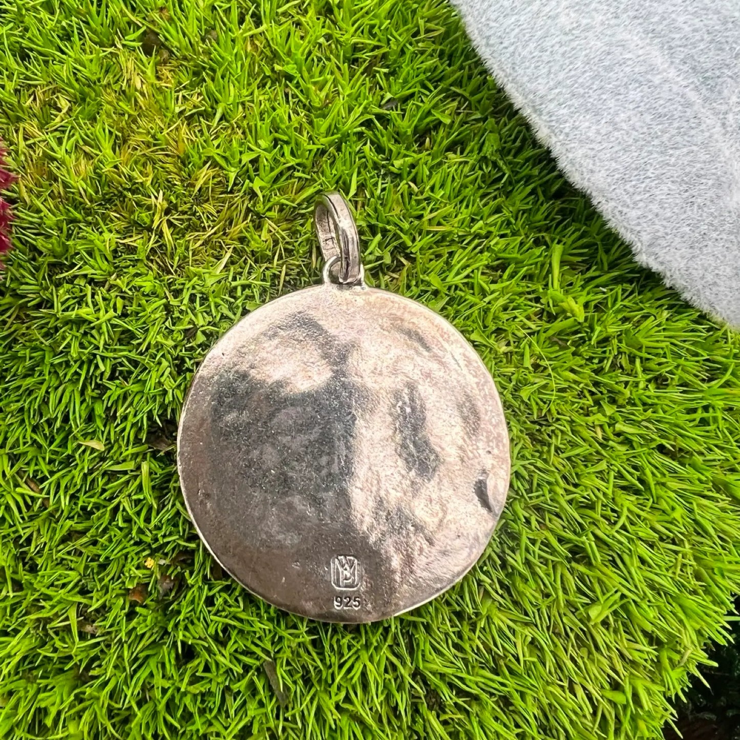 waxing poetic sterling silver back of pendant