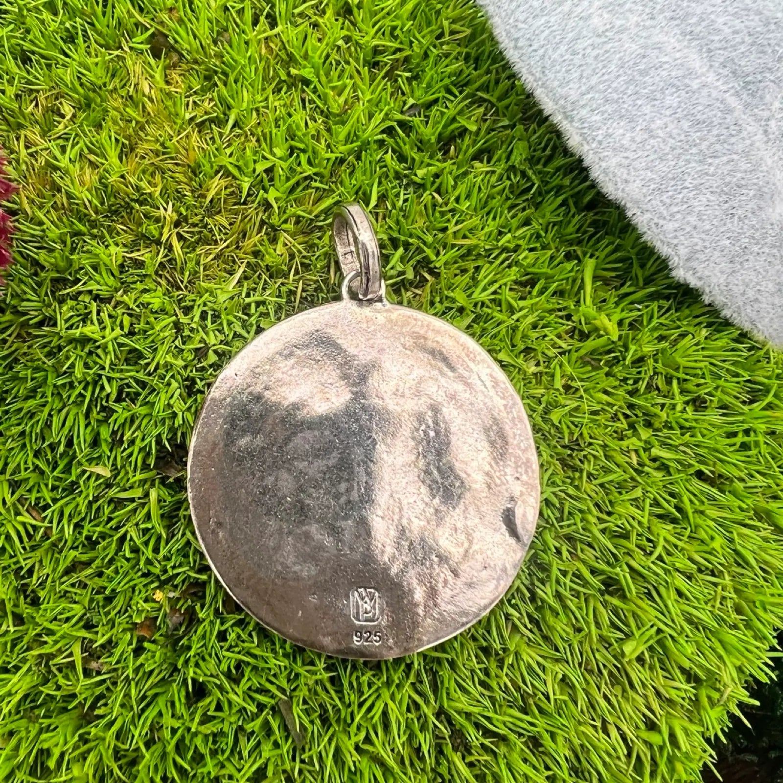 waxing poetic sterling silver back of pendant