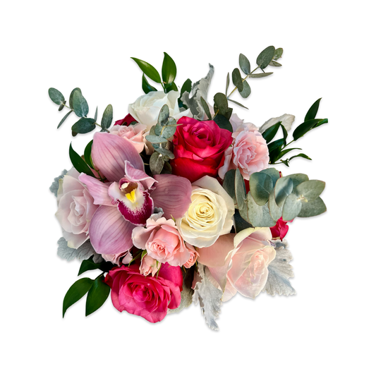 top view of pink rose flower arrangement with an orchid