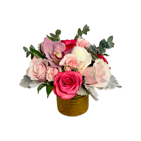 pink roses in a gold vase