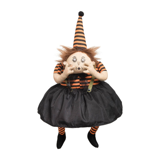 Halloween-themed doll by Joe Spencer with striped hat and black skirt on a white background