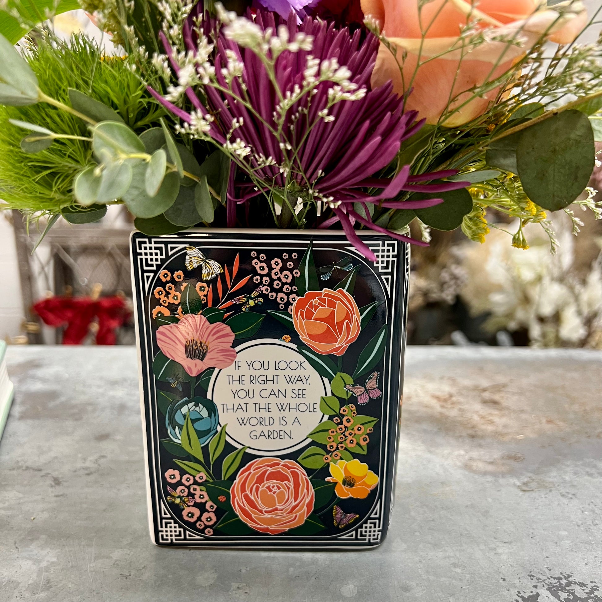 The back of ceramic The Secret Garden book vase. Available for Las Vegas delivery