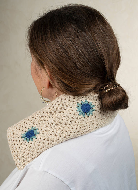 woman wearing crochet therapy wrap filled with lavender