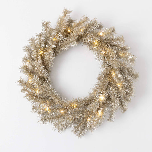 Decorative wreath with lights on a white background