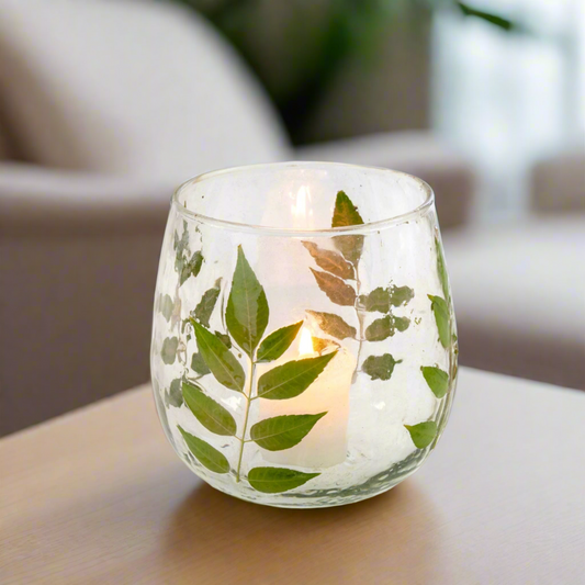 pressed leaf votive on coffee table